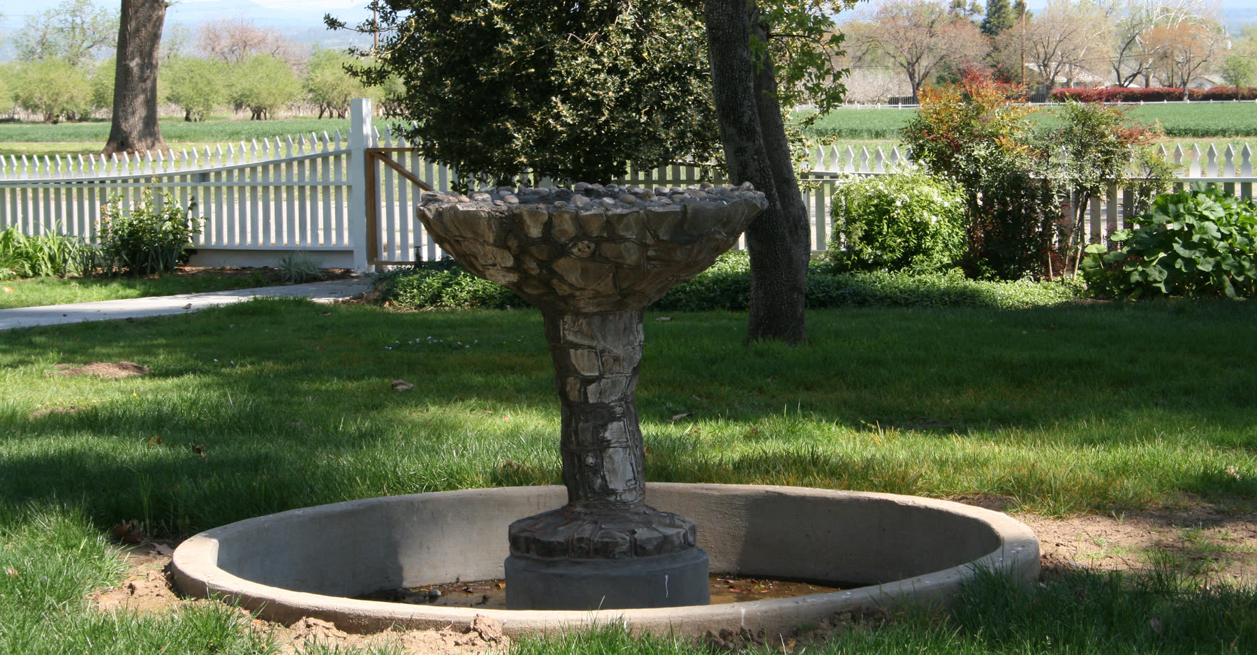 The stone fountain on the Glenwood grounds at the Patrick Ranch Museum.