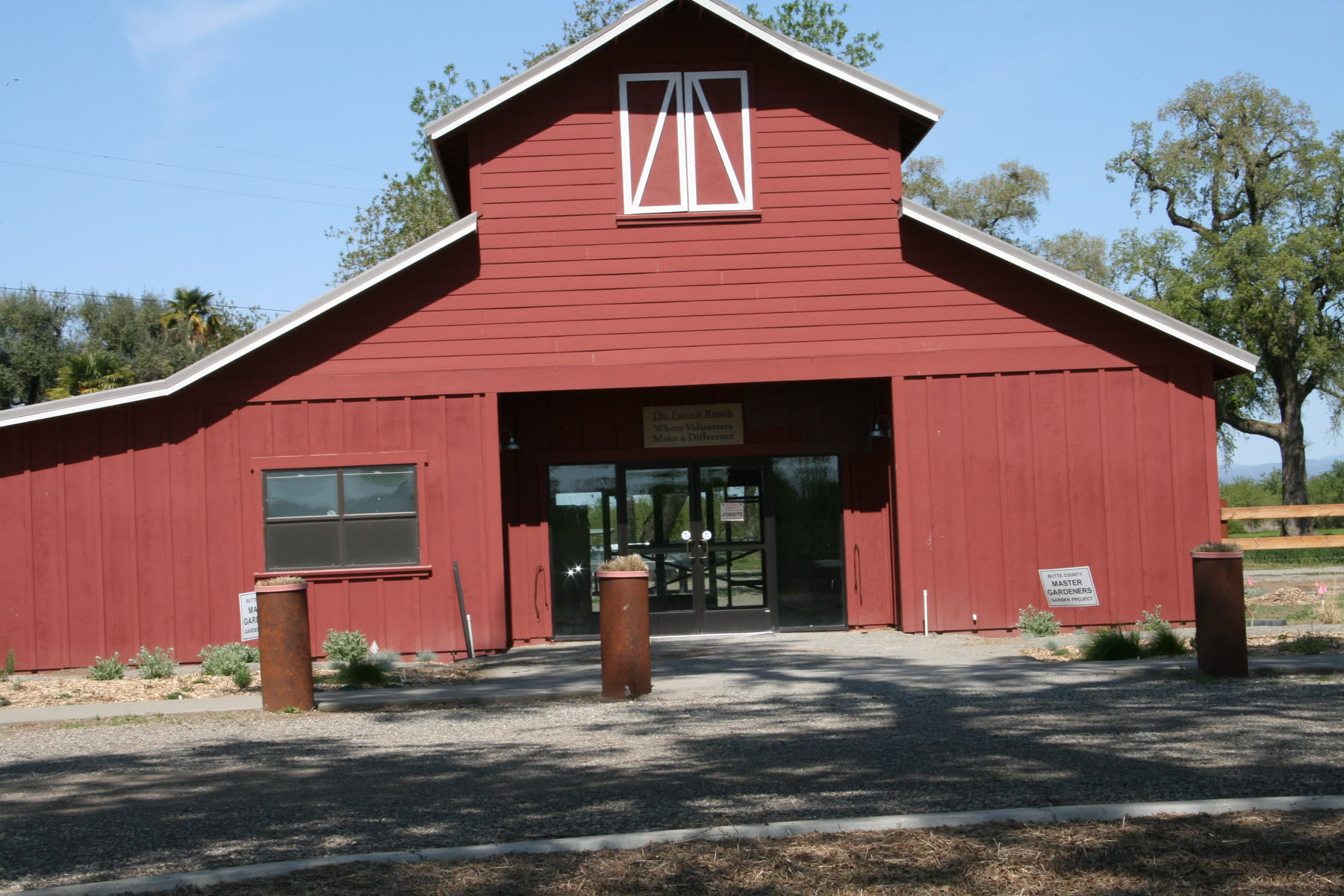 The Glenwood Visitor Center and Gift Shop, a red barn on the Patrick Ranch grounds.